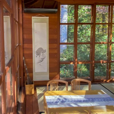Kikue's Tea House (Options: 12 ft L x 12 ft W, Standard Wood Roof, Mature Redwood, Electrical Wiring Trim for 2 Posts, Interior Decking with Exterior Deck, with a Wood Handle, with a Ceiling Fan Base, with Acrylic Sliding Doors and Screen Sliding Doors by Custom Request, Transparent Premium Sealant). Photo Courtesy of Eric & Dasa Mortensen of Davidson, North Carolina.