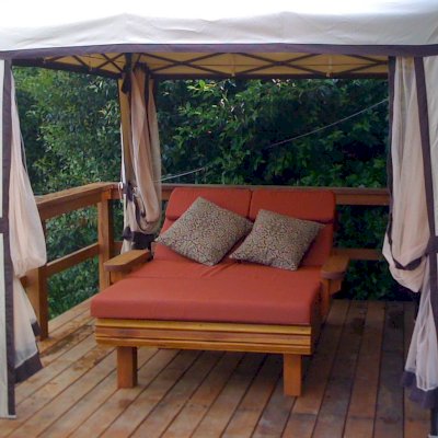 La Grange Redwood Lounger (Options: Double, California Redwood, Snack Trays on both sides, 15.5" H, Wheels, 3" Thick Cushion, 3 section cushion,Transparent Premium Sealant). Custom throw cushions available by request. Photo Courtesy of Ms. Ginny Walter of Mill Valley, CA.