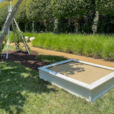 La Playa Sandbox (Options: 72" L x 60" W x 15" H, California Redwood, No Lid, Custom White Paint). Photo Courtesy of R. Newman of Los Angeles, CA.