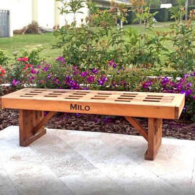 Lighthouse Garden Bench (Options: 5 ft L x 17 3/4 inches W x 17 inches H, Mature Redwood, No Cushion, Custom Engraving, Transparent Premium Sealant). Photo Courtesy of S. Porcaro of Windermere, Florida.
