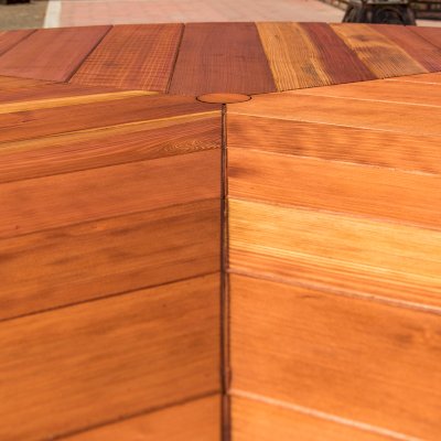 Lisa's Retro Outdoor Patio Table (Options: 5' Diameter, No Seating, California Redwood, Standard Tabletop, No Lazy Susan, 2" Diameter Umbrella Hole, Transparent Premium Sealant). Photo Courtesy of D. Culbert of Carson City, Nevada.