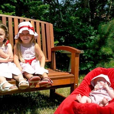 Luna Wood Bench (Options: 5 ft, Old-Growth Redwood, No Cushion, Custom Engraving, Transparent Premium Sealant). Photo Courtesy of Carla Cody of Lakeland, FL.