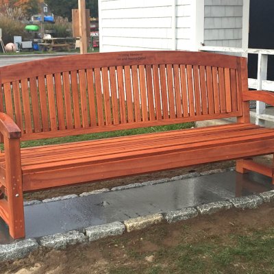Luna Wood Memorial Bench (Options: 6 ft, Old-Growth Redwood, No Cushion, Custom Engraving, Transparent Premium Sealant). Photo Courtesy of Bob C. of Marion, Massachusetts.