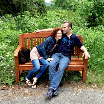 Luna Wood Memorial Bench (Options: 5 ft, Mature Redwood, No Cushion, No Engraving, Custom Plaque Inlay in Center of Backrest, Transparent Premium Sealant). Photo Shows: The Maggie Pickard Memorial Bench at the Norman Rockwell Museum: Stockbridge, MA.