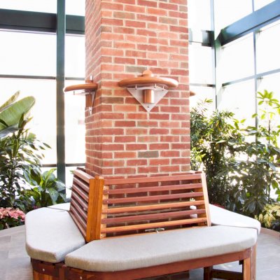 Maria's Tree Benches (Options: 6 1/2', California Redwood, No Beverage Ledge, Add Custom Cushion, No Engraving, Transparent Premium Sealant). Photo Courtesy of ECHN Hospital, Manchester CT 06040. 