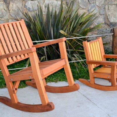 Massive Wooden Rocking Chair (Options: Standard Width, Tall, Mature Redwood, No Cushion, Transparent Premium Sealant). Photo Also Shows a Kid's Rocking Chair in California Redwood. 