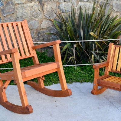 Massive Wooden Rocking Chair (Options: Standard Width, Tall, Mature Redwood, No Cushion, Transparent Premium Sealant). Photo Also Shows a Kid's Rocking Chair in California Redwood. 