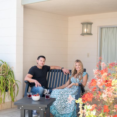 Massive Wooden Rocking Bench (Options: 4ft L, Deep, Douglas-fir, No Cushion, No Engraving, Black Stain Premium Sealant). Photo Also Shows a Square Side Table. Photo Courtesy of El Estero Beach Resort of Ensenada, Baja, Mexico. 