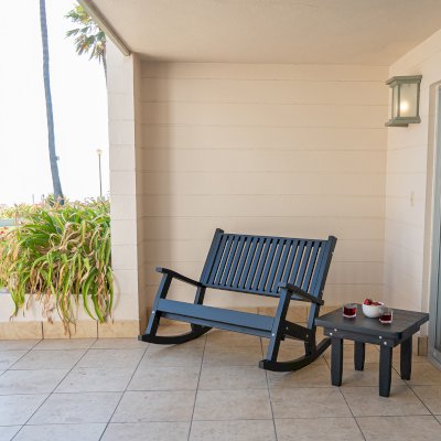 Massive Wooden Rocking Bench (Options: 4ft L, Deep, Douglas-fir, No Cushion, No Engraving, Black Stain Premium Sealant). Photo Also Shows a Square Side Table. Photo Courtesy of El Estero Beach Resort of Ensenada, Baja, Mexico. 