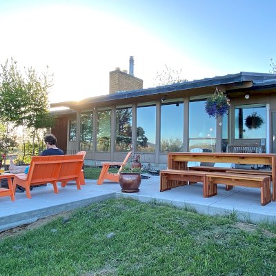 Maynard Modern Redwood Patio Table (Options: 7' L, 34 1/2" W Tabletop, Side Benches, Mosaic Redwood, 2 Half Length Maynard Benches Per Side, Standard Tabletop, No Umbrella Hole, Transparent Premium Sealant). Photo Courtesy of J. Davenport of Butte, Montana.