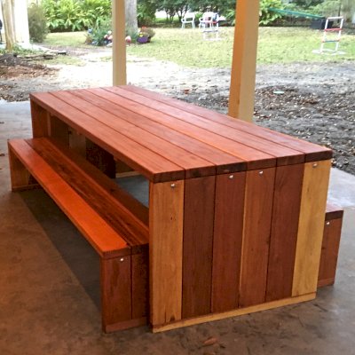 Maynard Modern Redwood Patio Table (Options: 7' L, 34 1/2" W Tabletop, Side Benches, California Redwood, One Full Length Bench on One Side and Two Half Length Benches on the Other by Custom Request), Standard Tabletop, No Umbrella Hole, Transparent Premium Sealant). Photo Courtesy of P. Ankney of Bellaire, TX.