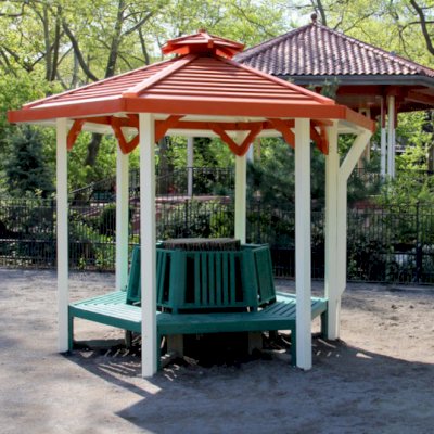 Memorial Natural Redwood Tree Bench (Options: 8 1/2 ft, Douglas-fir, No Beverage Ledge, No Cushions, No Engraving, Grey Primer & Painted Green by Customer). Roof Made by Forever Redwood as Follow Up After Tree Was Cut to Add Shade.