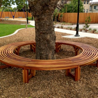 Custom Miramar Half Circle Tree Bench (Options: 10 1/2 ft [Full Circle by Custom Request], California Redwood, Transparent Premium Sealant). Photo Courtesy of Pogo Park of Richmond, CA (www.pogopark.org).