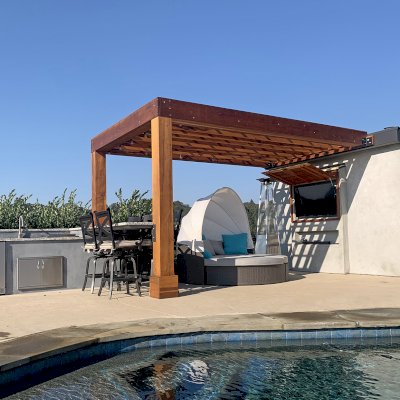 Custom Modern Fat Timber Pergola (Options: 20' L x 14' W, California Redwood, No Rain Guard, 9 ft H, No Electrical Wiring Trim, No Curtain Rods, Attached to Existing Building, 2-Post Anchor Kit for Concrete, No Post Decorative Trims, No Ceiling Fan Base, Transparent Premium Sealant). Photo Courtesy of Andy D'amico of Soquel, CA.