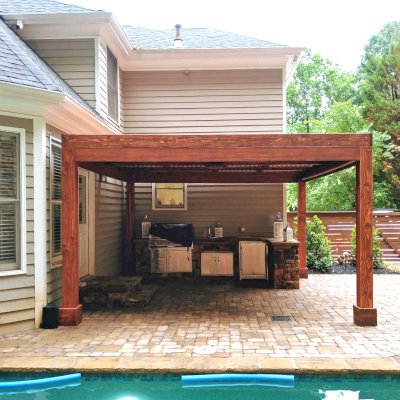 Modern Louvered Garden Pergola (Options: 15' L x 15' W, 8'' x 8'' Posts, Mobile Louvers, Douglas-fir, 9 ft H, 1 Electrical Wiring Trim, 2 Curtain Rods, 4 Post Anchor Kit for Concrete, No Post Decorative Trims, 1 Ceiling Fan Base, Coffee-Stain Premium Sealant). Photo Courtesy of J. Mcknight of Smyrna, Georgia.