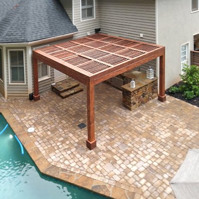 Modern Louvered Garden Pergola (Options: 15' L x 15' W, 8'' x 8'' Posts, Mobile Louvers, Douglas-fir, 9 ft H, 1 Electrical Wiring Trim, 2 Curtain Rods, 4 Post Anchor Kit for Concrete, No Post Decorative Trims, 1 Ceiling Fan Base, Coffee-Stain Premium Sealant). Photo Courtesy of J. Mcknight of Smyrna, Georgia.