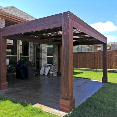 Modern Louvered Garden Pergola (Options: 16' L x 12' W, 10'' x 10'' Posts, Mobile Louvers, California Redwood, 9 ft H, 1 Electrical Wiring Trim, No Curtain Rods, 4 Post Anchor Kit for Concrete, No Post Decorative Trims, 1 Ceiling Fan Base, Coffee Stain Premium Sealant). Photo Courtesy of G. Moore of Wylie, Texas.