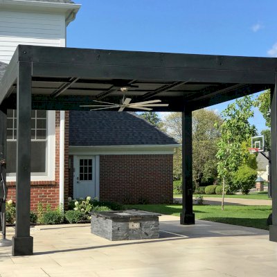 Modern Louvered Garden Pergola (Options: 14' L x 14' W, 8'' x 8'' Posts, Mobile Louvers, California Redwood, 10 ft H, 2 Electrical Wiring Trims, No Curtain Rods, 4 Post Anchor Kit for Concrete, No Post Decorative Trims, 1 Ceiling Fan Base, Custom Black Stain). Photo Courtesy of B. Amiano of Carmel, Indiana.