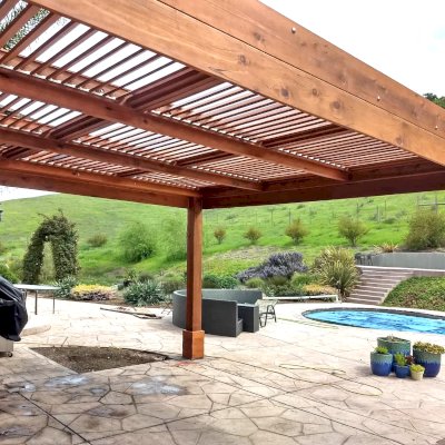 Modern Louvered Garden Pergola (Options: 20' L x 15' W, 8'' x 8'' Posts, Mobile Louvers, Mature Redwood, 9.5 ft H, 1 Electrical Wiring Trim, 4-Post Anchor Kit for High-Wind, No post decorative trims, 1 Ceiling Fan Base, Transparent Premium Sealant). Photo Courtesy of D. Ruprecht of Hollister, CA.
