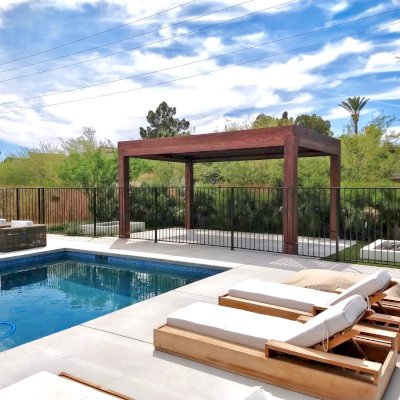 Modern Louvered Garden Pergola (Options: 18' L x 12' W, 10'' x 10'' Posts, Mobile Louvers, California Redwood, 9.5 ft H, 1 Electrical Wiring Trim, 2 Curtain Rods, 4 Post Anchor Kit for Concrete [Seamless by Custom Request], No Post Decorative Trims, 1 Ceiling Fan Base, Coffee-Stain Premium Sealant). Photo Courtesy of G. Hewson of Phoenix, Arizona.