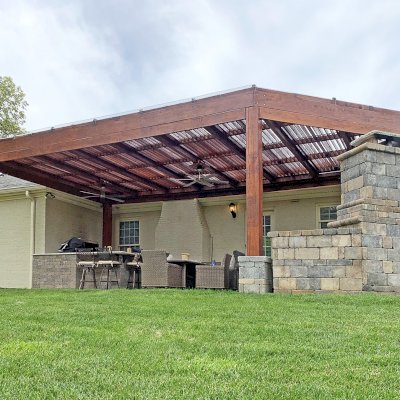 Custom Modern Louvered Garden Pergola (Options: 32' L x 18' W, 10'' x 10'' Posts, Mobile Louvers, Douglas-fir, 10 ft H, No Electrical Wiring Trim, No Curtain Rods, 6 Post Anchor Kit for Concrete, No Ceiling Fan Base, No Trim Kits for The Posts, Transparent Premium Sealant, with Rain Guard System for Waterproofing). Photo Courtesy of J. Cole of Louisville, Kentucky.