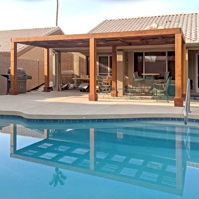 Modern Louvered Garden Pergola (Options: 24' L x 8' W, 8'' x 8'' Posts, Mobile Louvers, California Redwood, 8 ft H, No Electrical Wiring Trim, No Curtain Rods, 6 Post Anchor Kit for Concrete, No Post Decorative Trims, No Ceiling Fan Base, Transparent Premium Sealant). Photo Courtesy of K. St. John of Phoenix, Arizona.