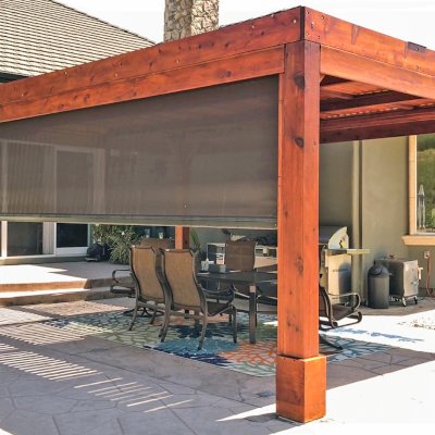 Modern Louvered Garden Pergola (Options: 20' L x 15' W, 8'' x 8'' Posts, Mobile Louvers, Mature Redwood, 9.5 ft H, 1 Electrical Wiring Trim, 4-Post Anchor Kit for High-Wind, No post decorative trims, No Ceiling Fan Base, Transparent Premium Sealant). Retractable Motorized Shade is a Sunroll from Sunesta Retractable Screens, for more information: https://www.sunesta.com/products/the-sunroll. Photo Courtesy of D. Ruprecht of Hollister, CA.