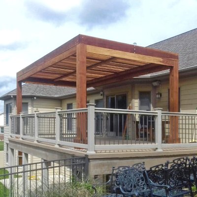 Modern Louvered Garden Pergola (Options: 20' L x 12' W, 8'' x 8'' Posts, Mobile Louvers, California Redwood, 9.5 ft H, 1 Electrical Wiring Trim, 1 Curtain Rod, 4 Post Anchor Kit for Concrete, No Post Decorative Trims, No Ceiling Fan Base, Transparent Premium Sealant). Photo Courtesy of N. Korte of Trenton, Illinois.