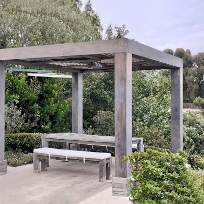 Custom Modern Louvered Garden Pergola (Options: 12' L x 10' W, 10'' x 10'' Posts, Mobile Louvers, California Redwood, 9 ft H, 1 Electrical Wiring Trim, No Curtain Rods, 4 Post Anchor Kit for Concrete, 1 Ceiling Fan Base, Custom Weathered Finish by Custom Request is Lifetime Wood Treatment-Valhalco). Photo Courtesy of O. Case of Malibu, California.