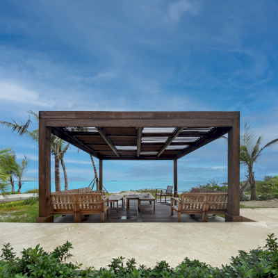 Modern Louvered Garden Pergola (Options: 16' L x 16' W, 8'' x 8'' Posts, Mobile Louvers, Mature Redwood, 9.5 ft H, No Electrical Wiring Trim, No Curtain Rods, 4 Post Anchor Kit for High-Wind, No Post Decorative Trims, No Ceiling Fan Base, Coffee-Stain Premium Sealant). Photo Courtesy of R. Dercks of Ft. Lauderdale, Florida.