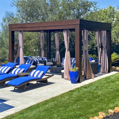 Modern Louvered Garden Pergola (Options: 16' L x 12' W, 10'' x 10'', Fixed Louvers, Douglas-fir, 9.5 ft H, No Electrical Wiring Trim Kit, 4 Post Anchor Kit for Concrete, No Post Decorative Trims, No Ceiling Fan Base, 4 Curtain Rods, Coffee Stain Sealant). Photo Courtesy of R. McCan of El Dorado Hills, CA