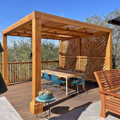 Modern Louvered Garden Pergola (Options: 12' L x 12' W, 8'' x 8'' Posts, Mobile Louvers, Douglas-fir, with 1 Lattice Privacy Wall, Electrical Wiring Trim for 1 Post, Without Fascia, No Curtain Rods, 4 Post Anchor Kit for Wood, No Post Decorative Trims, No Ceiling Fan Base, Transparent Premium Sealant). Photo Courtesy of S. Weinswig of Los Angeles, CA.