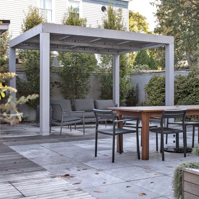 Modern Louvered Garden Pergola (Options: 14' L x 10' W, 8'' x 8'' Posts, Mobile Louvers, Old-Growth Redwood, 9.5 ft H, No Electrical Wiring Trim, No Curtain Rods, 4 Post Anchor Kit for High-Wind [Seamless by Custom Request], No Post Decorative Trims, No Ceiling Fan Base, Custom Paint [Platinum Grey]). Photo Courtesy of D. West of Weehawken, New Jersey.
