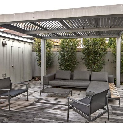 Modern Louvered Garden Pergola (Options: 14' L x 10' W, 8'' x 8'' Posts, Mobile Louvers, Old-Growth Redwood, 9.5 ft H, No Electrical Wiring Trim, No Curtain Rods, 4 Post Anchor Kit for High-Wind [Seamless by Custom Request], No Post Decorative Trims, No Ceiling Fan Base, Custom Paint [Platinum Grey]). Photo Courtesy of D. West of Weehawken, New Jersey.