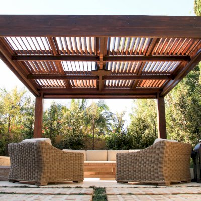Modern Louvered Garden Pergola (Options: 16' L x 16' W, 10'' x 10'' Posts, Mobile Louvers, California Redwood, 9.5ft H, Electrical Wiring Trim for 1 Post, 4 Post Anchor Kit for Concrete, No post decorative trims, Add a Ceiling Fan Base, 4 Curtain Rods, Coffee Stain Sealant). Photo Courtesy of S. Gillin of Del Mar, CA.