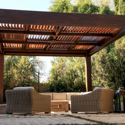 Modern Louvered Garden Pergola (Options: 16' L x 16' W, 10'' x 10'' Posts, Mobile Louvers, California Redwood, 9.5ft H, Electrical Wiring Trim for 1 Post, 4 Post Anchor Kit for Concrete, No post decorative trims, Add a Ceiling Fan Base, 4 Curtain Rods, Coffee Stain Sealant). Photo Courtesy of S. Gillin of Del Mar, CA.