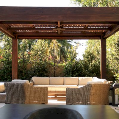 Modern Louvered Garden Pergola (Options: 16' L x 16' W, 10'' x 10'' Posts, Mobile Louvers, California Redwood, 9.5ft H, Electrical Wiring Trim for 1 Post, 4 Post Anchor Kit for Concrete, No post decorative trims, Add a Ceiling Fan Base, 4 Curtain Rods, Coffee Stain Sealant). Photo Courtesy of S. Gillin of Del Mar, CA.