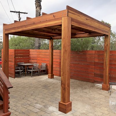 Modern Louvered Garden Pergola (Options: 10' L x 12' W, 8'' x 8'' Posts, Mobile Louvers, California Redwood, 9 ft H, Electrical Wiring Trim for 2 Posts, 4 Post Anchor Kit for Concrete, No post decorative trims, With a Ceiling Fan Base, Transparent Premium Sealant, 5 Slats with Slope on Top by Custom Request). Photo Courtesy of A. Carcieri of Los Angeles, CA.