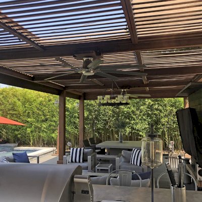 Modern Louvered Garden Pergola (Options: 29' L x 15' W, 8'' x 8'' Posts, Mobile Louvers, California Redwood, 9.5 ft H, 2 Electrical Wiring Trims, Curtain Rod Fascia, 8 Post Anchor Kit for Concrete, No Post Decorative Trims, 2 Ceiling Fan Bases, Coffee-Stain Premium Sealant). Photo Courtesy of M. Brown of Downey, CA.