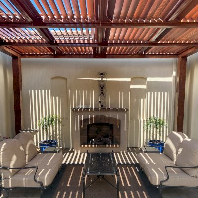 Modern Louvered Garden Pergola (Options: 16' L x 16' W, 8'' x 8'' Posts, Mobile Louvers, California Redwood, 9.5 ft H, No Electrical Wiring Trim, No Curtain Rods, 4 Post Anchor Kit for Concrete, No Post Decorative Trims, No Ceiling Fan Base, Coffee-Stain Premium Sealant). Photo Courtesy of T. Duvall of Reno, Nevada.