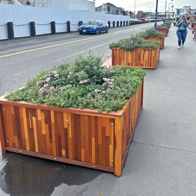 Napa Planters (Options: 48'' L x 48'' W x 24'' H, Mosaic Redwood, 1-inch Feet, Transparent Premium Sealant). Planters can be seen on the Fisherman's Wharf in San Francisco.