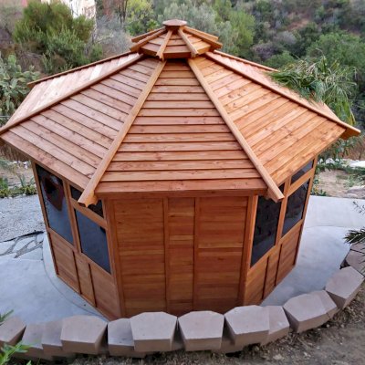 Octagonal Sunroom Gazebo (Options: 12' Diameter, No Deck, Douglas-fir, 36" H Siding Below Windows, 4 Window Panels & Solid Panels, 2 Sets of Doors, Transparent Premium Sealant). Photo Courtesy of Y. Fang of Diamond Bar, CA.