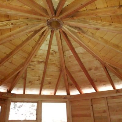 Octagonal Sunroom Gazebo (Options: 12' Diameter, No Deck, Douglas-fir, 36" H Siding Below Windows, 4 Window Panels & Solid Panels, 2 Sets of Doors, Transparent Premium Sealant). Photo Courtesy of Y. Fang of Diamond Bar, CA.