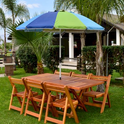 Outdoor Rectangular Folding Table (Options: 72" L, 35'' W, 6 Chairs, California Redwood, Standard Tabletop, Checkerboard Design Tabletop, Rounded Corners, Umbrella Hole (Umbrella not included), Transparent Premium Sealant). Photo Courtesy of El Laurel Resort of Baja, Mexico. 