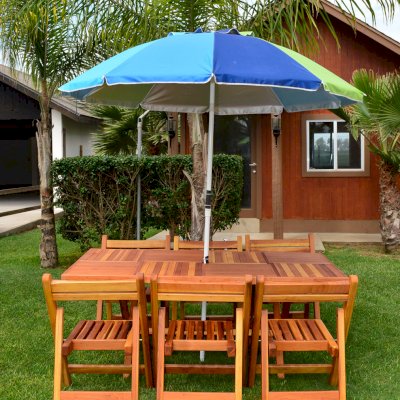 Outdoor Rectangular Folding Table (Options: 72" L, 35'' W, 6 Chairs, California Redwood, Standard Tabletop, Checkerboard Design Tabletop, Rounded Corners, Umbrella Hole (Umbrella not included), Transparent Premium Sealant). Photo Courtesy of El Laurel Resort of Baja, Mexico. 