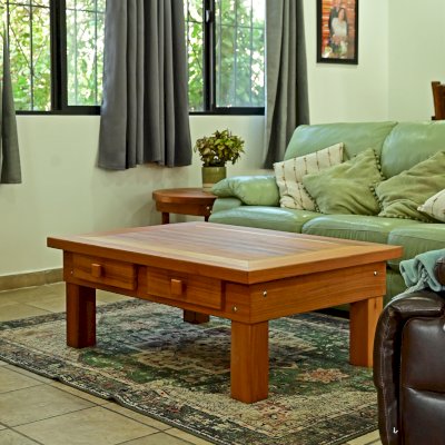 Oversized Coffee Table (Options: 48"L x 36" W, California Redwood, 4 Drawers, Seamless Tabletop, Transparent Premium Sealant). Photo Also Shows a Round Side Table.