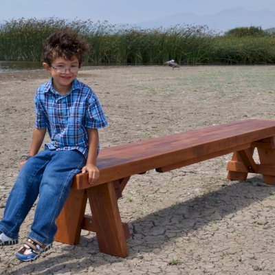 Parquet Wooden Bench (Options: 8 ft L x 17 3/4 inches W x 18 1/2 inches H, Old-Growth Redwood, No Cushion, No Engraving, Transparent Premium Sealant). Photo courtesy of Hernandez Family. 