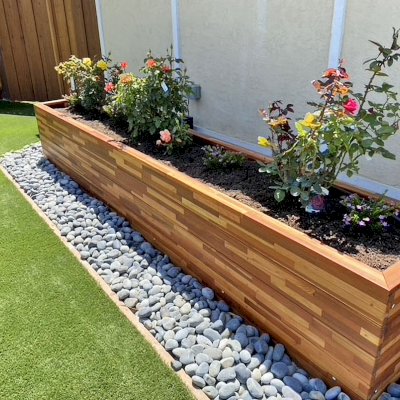 Mendocino Planters (Options: 144'' L, 24'' W x 24'' H, Mosaic Redwood, 1 3/4-inch Feet, No Casters, No Trellis, Interior and Exterior of Box with Sealant (No Growing Vegetables), Transparent Premium Sealant). Photo Courtesy of B. Bond of Newark, California.