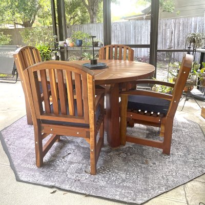 Sunset Patio Table (Options: 4.5' Diameter, With Chairs, California Redwood, 4 Luna Armchairs, No Cushions, Standard Tabletop, No Lazy Susan, No Umbrella Hole, Transparent Premium Sealant). Photo Courtesy of P. Weston of Casselberry, FL.