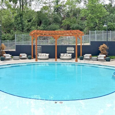 Fan Shaped Pergola Kit (Options: 25' x 12', Douglas-Fir, With Roof Slats, No Electrical Wiring Trim Kit, Post Anchor Kit for Concrete, No Ceiling Fan Base, 12' Posts, No Curtain Rods, Transparent Premium Sealant). Photo Courtesy of M. Barker of Whites Creek, TN.